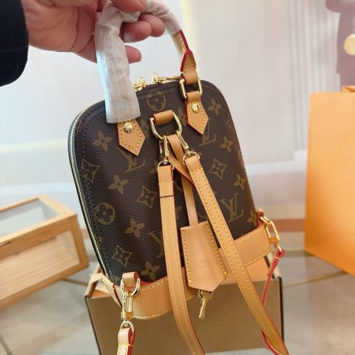 Lv Alma double-shoulder shell bag - Image 9